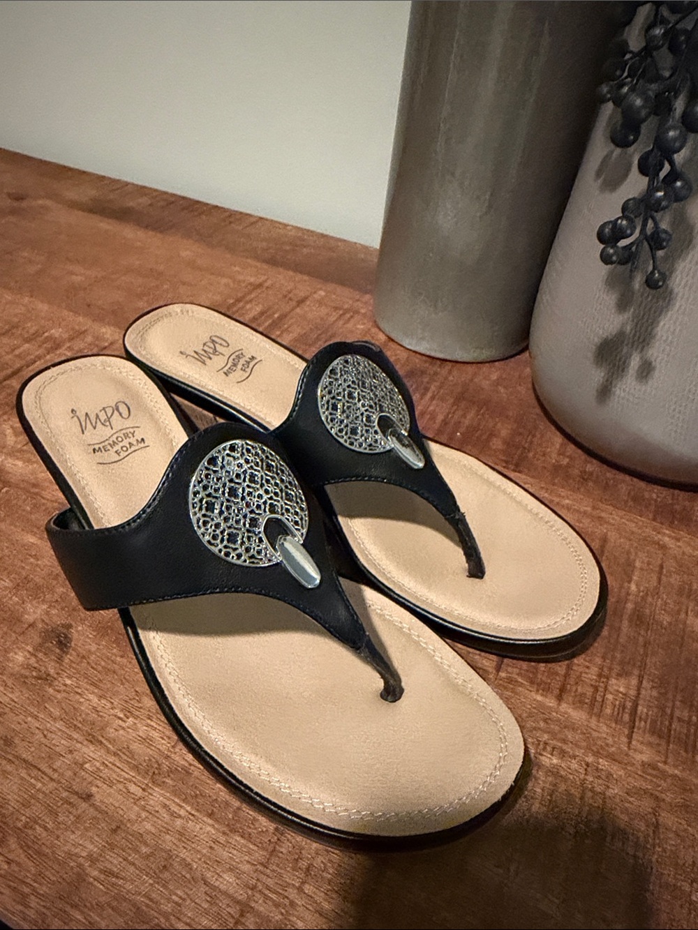 Impo Black and Tan Women's Toe-Post Sandals with Silver Medallion